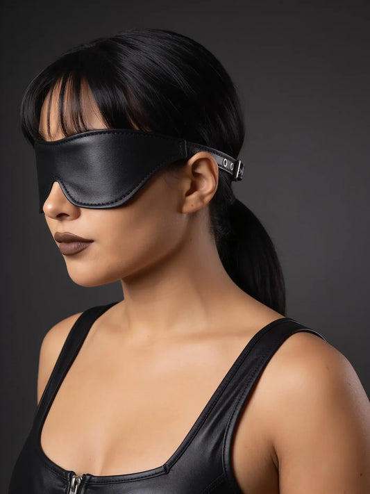 Sadie wearing the Leather Bondage Curved Blindfold with Buckle