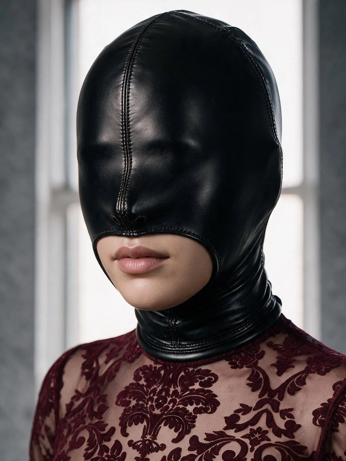 Sadie wearing the Faux Leather Open Mouth Bondage Hood with Zipper