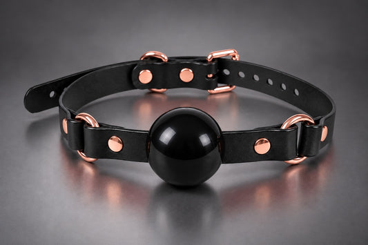 Leather Single Strap Bondage Ball Gag in Black, studio image